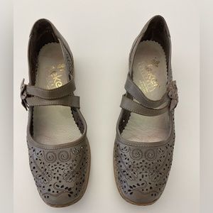 Rieker Shoes - tan/beige women’s leather maryjane flats with eyelet detail.